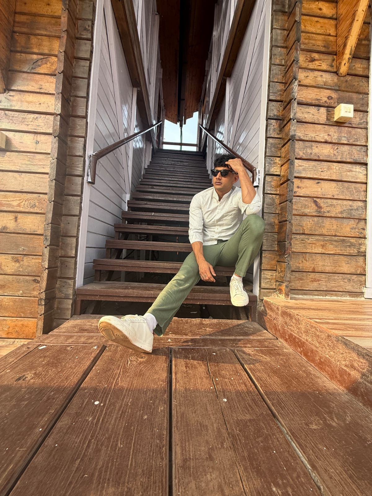 Men wearing green linen blend pants in summer in india which is breathable, soft and excellent for summers. 